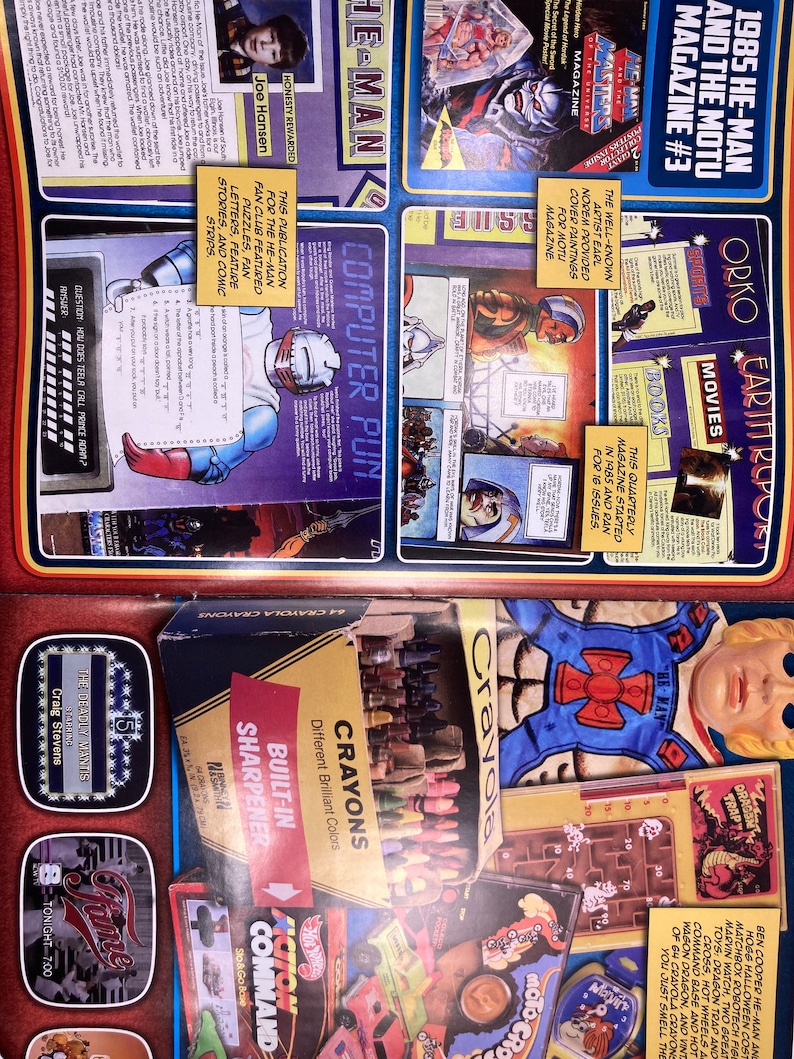 May include: A vintage magazine spread featuring He-Man and the Masters of the Universe. The layout includes comic strips, fan club content, and Crayola crayons. The magazine cover is titled "1985 He-Man and the MOTU Magazine #3."