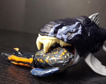 Juguete de Bothriolepis dañado en batalla (botín de Dunkleosteus)