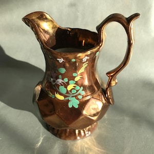 Embrace the Opulence of the Victorian Era with Our Exquisite Ewer-Shaped Antique Copper Lustre Glazed Pitcher