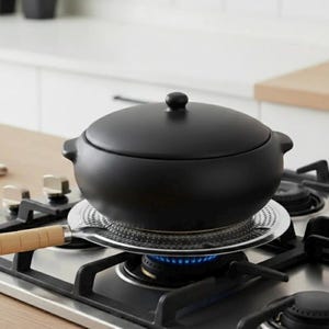 Difusor de calor a gas: Calor uniforme para ollas, tajines y cazuelas. Aluminio con mango de madera.