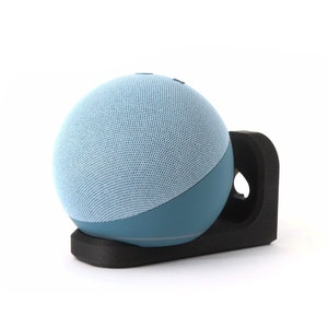 May include: A light blue and dark blue spherical smart speaker mounted on a black wall mount.
