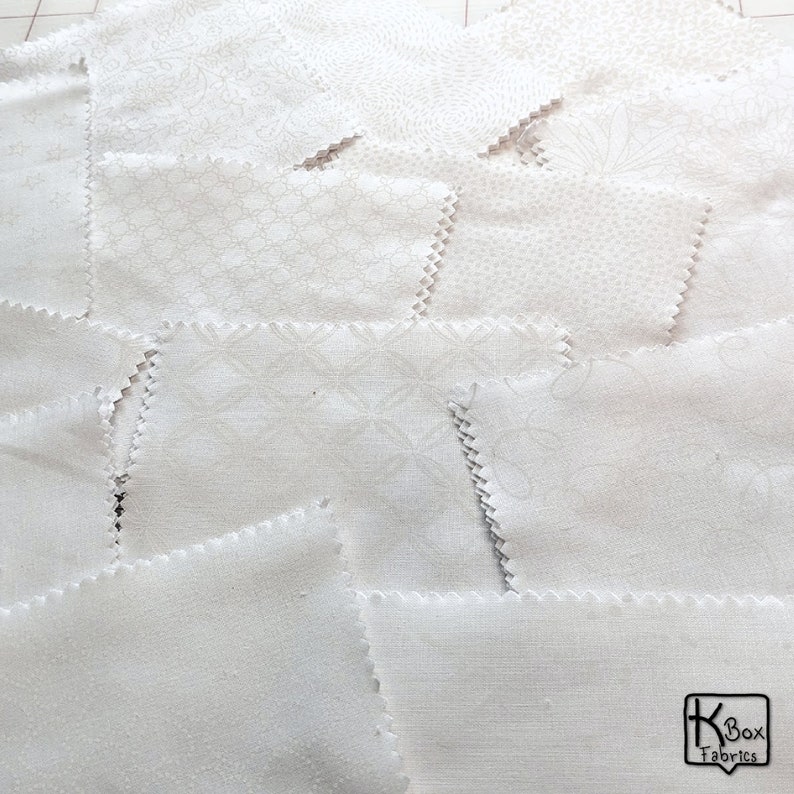 Precut bundle 5 inch charm pack fabric stacker includes 42 pieces. Cotton fabric charm pack from Maywood Studio. This cute white on white charm pack has hearts, stars, swirls, flowers and so much more. Great fabric bundle for quilters and crafters.