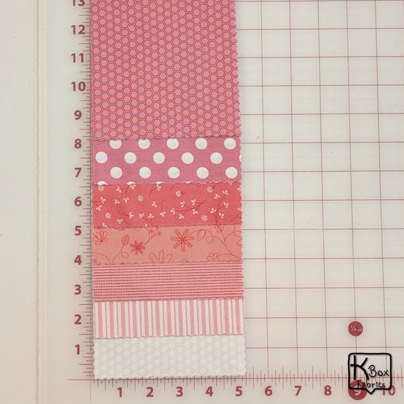 Precut bundle 5" charm pack fabric stacker includes 42 square 5" x 5" pieces. Kimberbell Basics The Be Mine line from Maywood Studio. Red, Pink and White quality quilting cotton fabric charm pack. Precut quilting cotton squares great blenders for quilting and embroidering. Great fabric bundle for quilters and crafters.