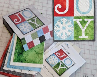 Kit para pancarta de mesa con diseño de copos de nieve y temática invernal, incluye caja de recuerdos, patrón y tela. Un proyecto ideal para hacer tú mismo. Regalo perfecto para una amante del patchwork.