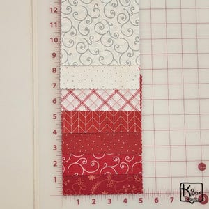 Precut bundle 5" charm pack fabric stacker includes 42 square 5" x 5" pieces. Kimberbell Basics The Be Mine line from Maywood Studio. Red, Pink and White quality quilting cotton fabric charm pack. Precut quilting cotton squares great blenders for quilting and embroidering. Great fabric bundle for quilters and crafters.
