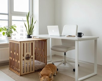 May include: A light-colored wooden dog crate with a rectangular design and vertical slats. A beige dog bed is inside the crate. A corgi dog is lying on a beige rug in front of the crate. A white desk, chair, and laptop are in the background.
