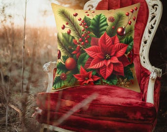 May include: A red and green Christmas pillow with a poinsettia, holly, and pine needles on a gold background.