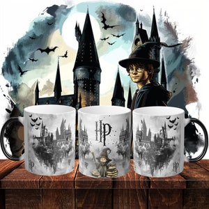 May include: Two black and white color changing mugs with a Harry Potter theme. One mug features the Hogwarts castle and the other mug features the Hogwarts castle with Harry Potter as a child holding a wand and books. Both mugs have the letters HP on them.