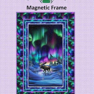 May include: A magnetic frame featuring a vibrant image of the Northern Lights over a snowy landscape with a moose. The frame is 38" x 56" and designed by Laureen Smith. The frame has a purple, green, and blue border. The text "Magnetic Frame" is displayed.