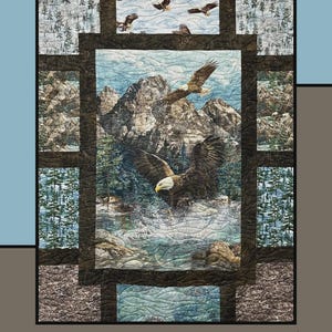May include: A quilt with a central image of eagles soaring over a mountain stream. The word "Fondue" is at the top. The quilt is framed with a border of forest and mountain scenes. Designed by Heidi Cook for Villa Rosa Designs.