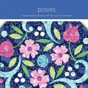 May include: A digital download pattern for a table topper featuring a floral design with pink, blue, and green flowers on a dark blue background. The pattern is called "posies" and is by Amanda Murphy.