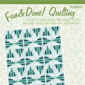 May include: A quilting pattern titled "Northern Lights" with a repeating design of teal and navy blue geometric shapes on a white background. The pattern is from Fairy Lake Quilt Designs and includes the text "Fun & Done! Quilting."