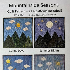 May include: Four quilt patterns for a 16-inch by 16-inch quilt, each depicting a different season: Spring Days, Summer Nights, Autumn Splendor, and Winter Wonder. The quilts feature a mountain range with a sun, moon, or stars in the sky.