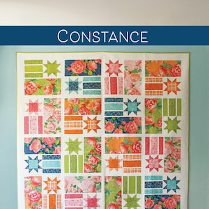May include: A quilt pattern called "Constance" by Robin Pickens Quilt Patterns. The quilt features a patchwork design with stars, stripes, and floral fabric. The pattern is available in three sizes: lap, twin, and queen.
