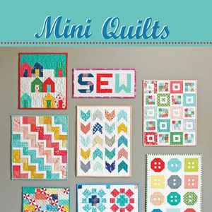 May include: A book cover with the title "Mini Quilts" and a colorful illustration of eight mini quilts hanging on a wall. The book cover also features a logo with the text "Cluck Cluck Sew" and a chicken illustration.