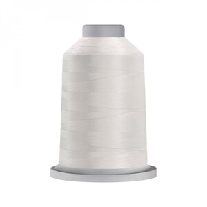May include: A white spool of thread for sewing or embroidery.