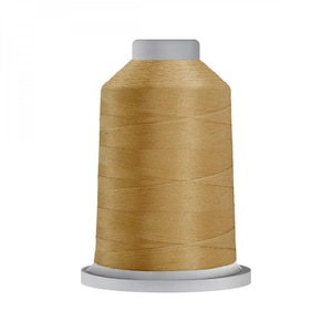 May include: A spool of golden yellow thread for sewing or embroidery.