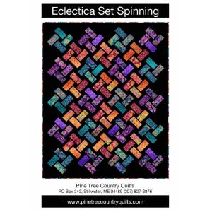 May include: A colorful quilt with a repeating geometric pattern of rectangular blocks in shades of teal, purple, orange, and red on a black background. The quilt is labeled "Eclectica Set Spinning."