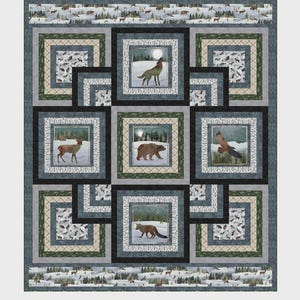 May include: A quilt with a central design featuring square panels with wildlife scenes, including a wolf, bear, deer, and fox in a snowy landscape. The quilt has a border with a forest and the text "Step into Moonlight".