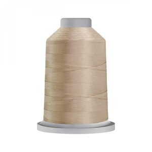 May include: A spool of beige embroidery thread.