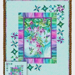 May include: A colorful quilt featuring the text "Quite Contrary" and "Concerto." The quilt has a central panel with hummingbirds and flowers, surrounded by a turquoise border and star patterns. Sizes include 63" x 76" and 79" x 92".