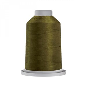 May include: A spool of olive green thread.