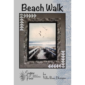 May include: A quilt pattern titled Beach Walk by Sugar Pine Quilt Designs for Villa Rosa Designs. The cover features a central image of a wooden boardwalk leading to the ocean with birds flying above, framed by grey fabric with triangle accents.