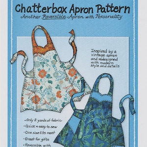 May include: A blue and white pattern for a Chatterbox Apron Pattern by Mary Mulari Designs. The pattern features two apron designs, one with floral patterns and the other with a blue leaf pattern. The text says "Another Reversible Apron with Personality."