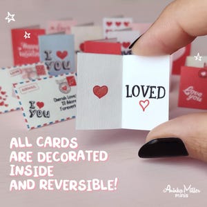 Miniature Valentines Day cards, tiny handmade cards with reversible designs and decorated interiors. Features cute You Are Loved messages, hearts, and vintage-style letters in red and pastel tones.