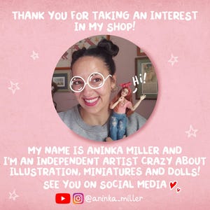 May include: Pink background with white text that reads "THANK YOU FOR TAKING AN INTEREST IN MY SHOP!". A woman with glasses holds a doll. Text below reads "MY NAME IS ANINKA MILLER AND I'M AN INDEPENDENT ARTIST CRAZY ABOUT ILLUSTRATION, MINIATURES AND DOLLS!"