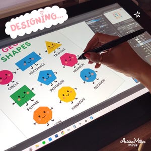 Digital illustration in progress on a tablet, showing the design of colorful cartoon geometric shapes like circle, square, triangle, hexagon, and more. Hand holding a stylus while creating printable miniature school posters for dollhouse classrooms by Aninka Miller Minis
