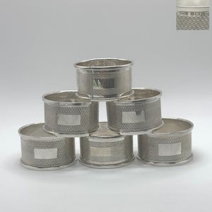 Lot de 6 ronds de serviette en argent sterling Birmingham 1953-1971, motif guilloché