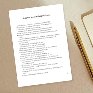 May include: A white sheet of paper with the title "Interventions thérapeutiques" and a list of therapeutic interventions in French. A gold pen and a notebook are in the background.
