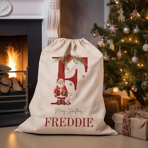 Sacco di Babbo Natale personalizzato, 20,5 × 30 pollici Sacco di Natale, Sacco di giocattoli di Natale personalizzato Nome iniziale, Sacchetto regalo di Natale, Primo regalo di Natale