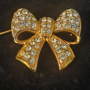 Vintage Swarovski Crystal Bow Brooch – Gold Tone with Clear Crystals, Swan Signed