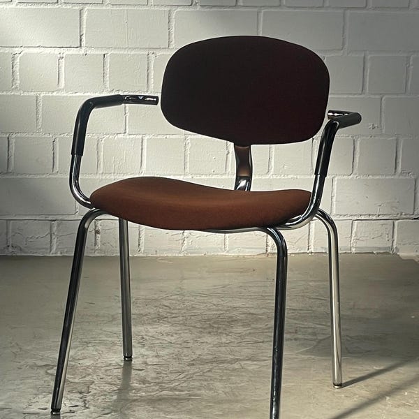 Vintage Bauhaus Chrome Tubular Chair: Stacking Armchair, Brown Fabric