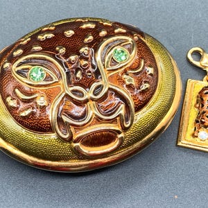 Boîte à pilules Edgar Berebi panthère avec breloque panthère en strass