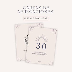 Puede incluir: Dos tarjetas de afirmación color crema con el texto "CARTAS DE AFIRMACIONES" e "INSTANT DOWNLOAD". Una tarjeta presenta un diseño de sol con el número "30" y el texto "AFIRMACIONES PARA ABUNDANCIA". La otra tarjeta tiene un diseño floral.