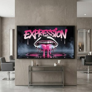 May include: A large black framed art print featuring a stylized mouth with dripping pink and blue liquid. The word "EXPRESSION" is written above the mouth in pink graffiti-style lettering. The background is dark with smoky effects.