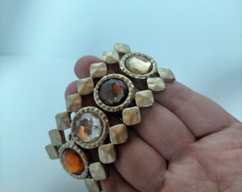 Gouden armband voor dames met gekleurde stenen, elegant elastisch model aanpasbaar aan elke gelegenheid