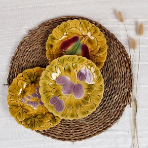 Majolica dessert plates, handcrafted in France. Set of 3 small dishes, fruit decoration, grapes, plums, pears. Slush.