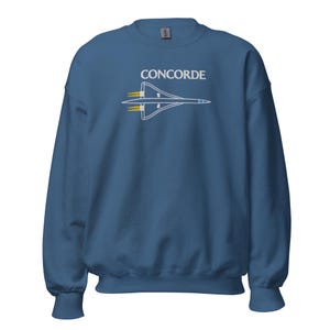 May include: A dark blue sweatshirt featuring a white outline of the Concorde supersonic jet and the word "CONCORDE" in white lettering.