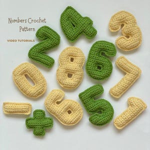 May include: A collection of crochet numbers and a plus sign in light yellow and green yarn. The numbers zero through nine are displayed with a textured stitch pattern. Text on the image reads Numbers Crochet Pattern and VIDEO TUTORIALS.