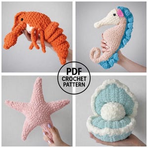 May include: Four crocheted sea creatures are shown: an orange lobster, a pink seahorse with blue details, a pink starfish, and a blue and white clam shell with a white pearl. The image includes the text "PDF CROCHET PATTERN".