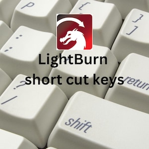 May include: A white keyboard with the words "LightBurn short cut keys" and the words "shift", "alt", and "return" on the keys. A red logo with a dragon is in the top right corner of the image.