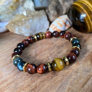 bracelet Hawk&#39;s Eye, Tiger&#39;s Eye, Bull&#39;s Eye, Root Chakra, Solar Chakra, Third Eye Chakra, Crown Chakra, gold, untinted