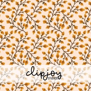 May include: A repeating pattern of dark brown branches with golden yellow leaves set against a light peach background. The text clipjoy STUDIOS is printed in black across a horizontal white band overlaying the center of the design.