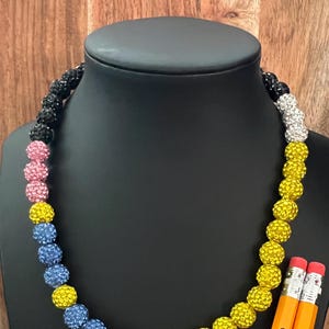 Collana con perline a goccia ispirata al baseball MLB e matita per la scuola