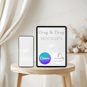 May include: A smartphone and a tablet with white screens displayed on a wooden table. The tablet screen features the text Drag & Drop MOCKUPS, a Canva logo, and a circular badge stating 3 MOCKUPS INCLUDED. The devices have thin black frames.
