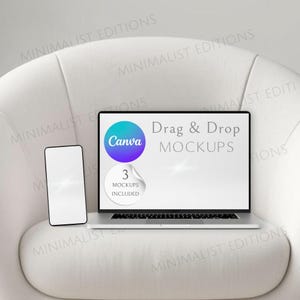 May include: A laptop and smartphone are displayed on a white armchair. The laptop screen shows the Canva logo and the text "Drag & Drop MOCKUPS." A sticker on the screen says "3 MOCKUPS INCLUDED."